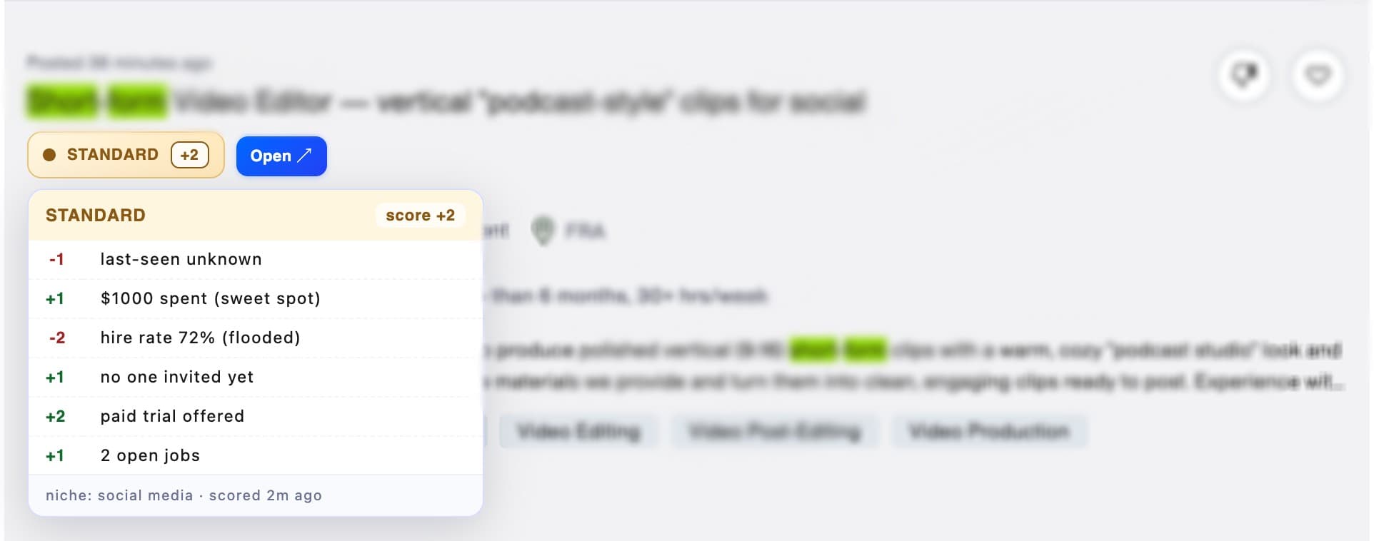 Per-job score chip with open tooltip showing the contributing signals